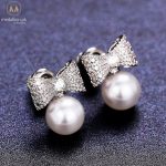 White Gold Plated Simulated Pearl Bow Shape Stud Earrings
