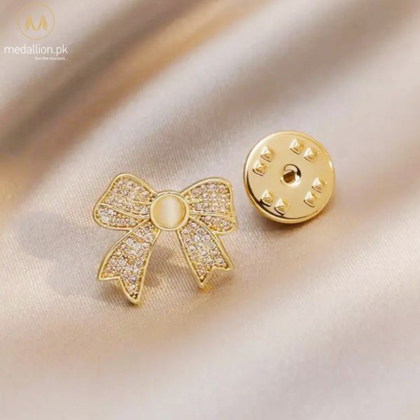 Trendy Champagne Color Zirconia Bow Style Lapel Pin